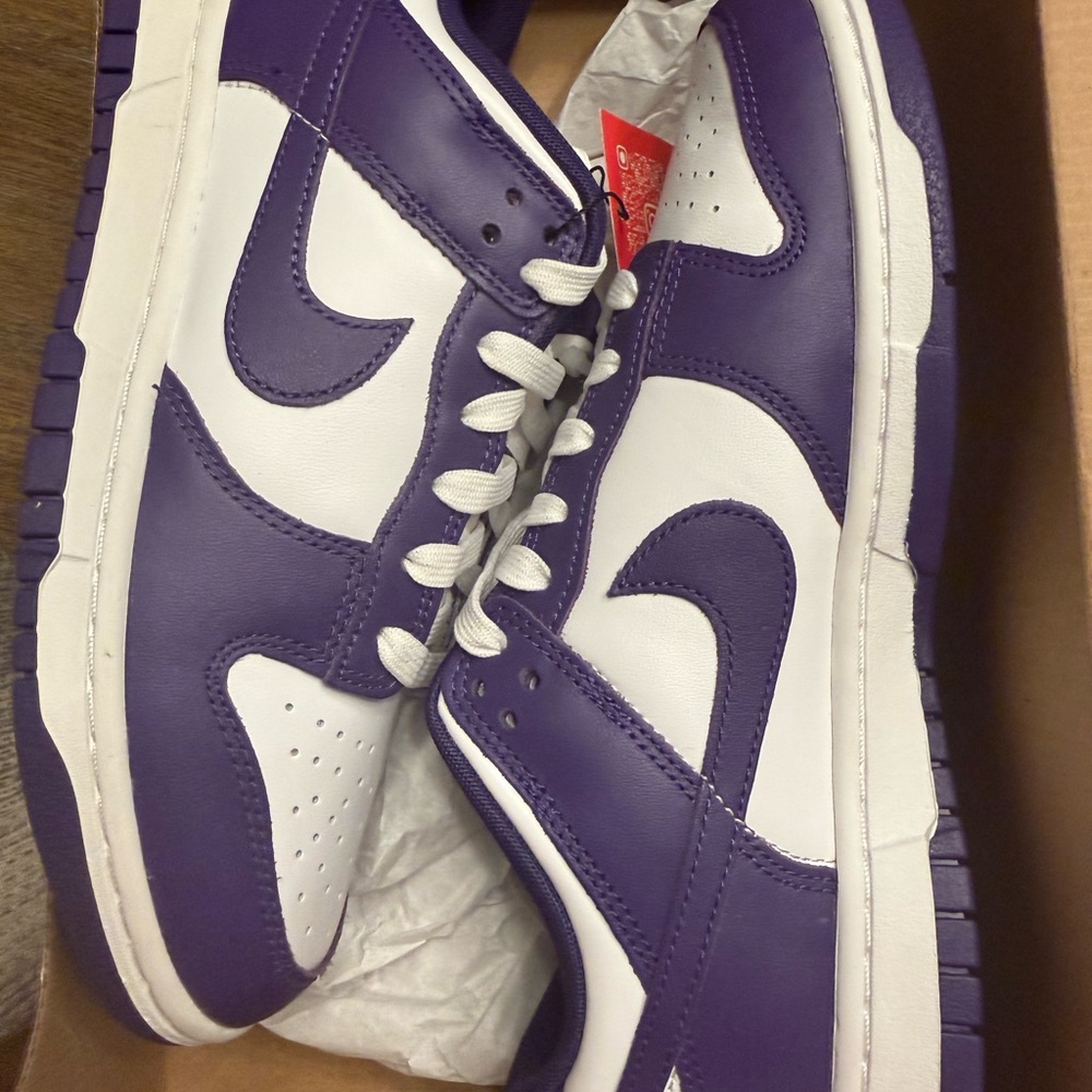 Nike Dunk Low Retro in White and Court Purple